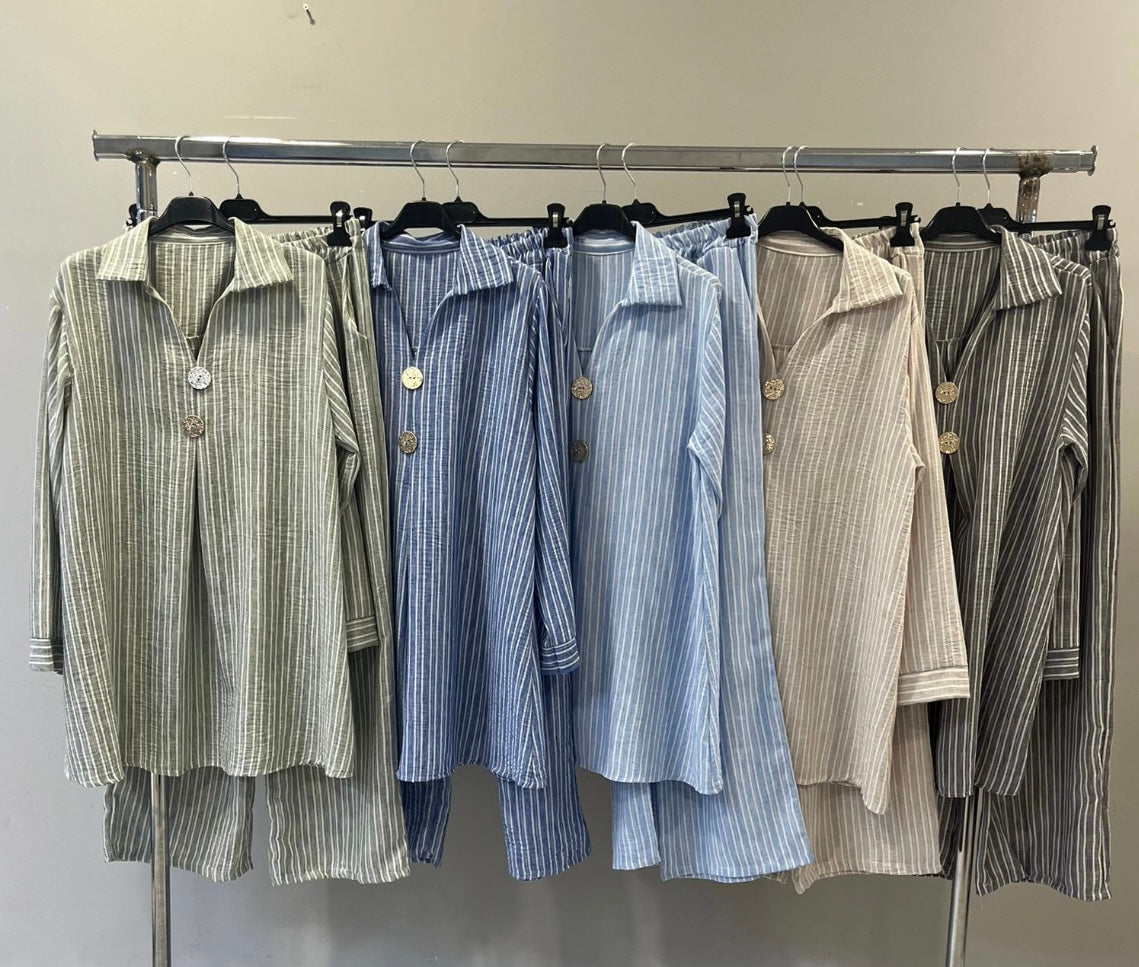 Casual beige cotton co ord set for women with oversized shirt and tapered trousers