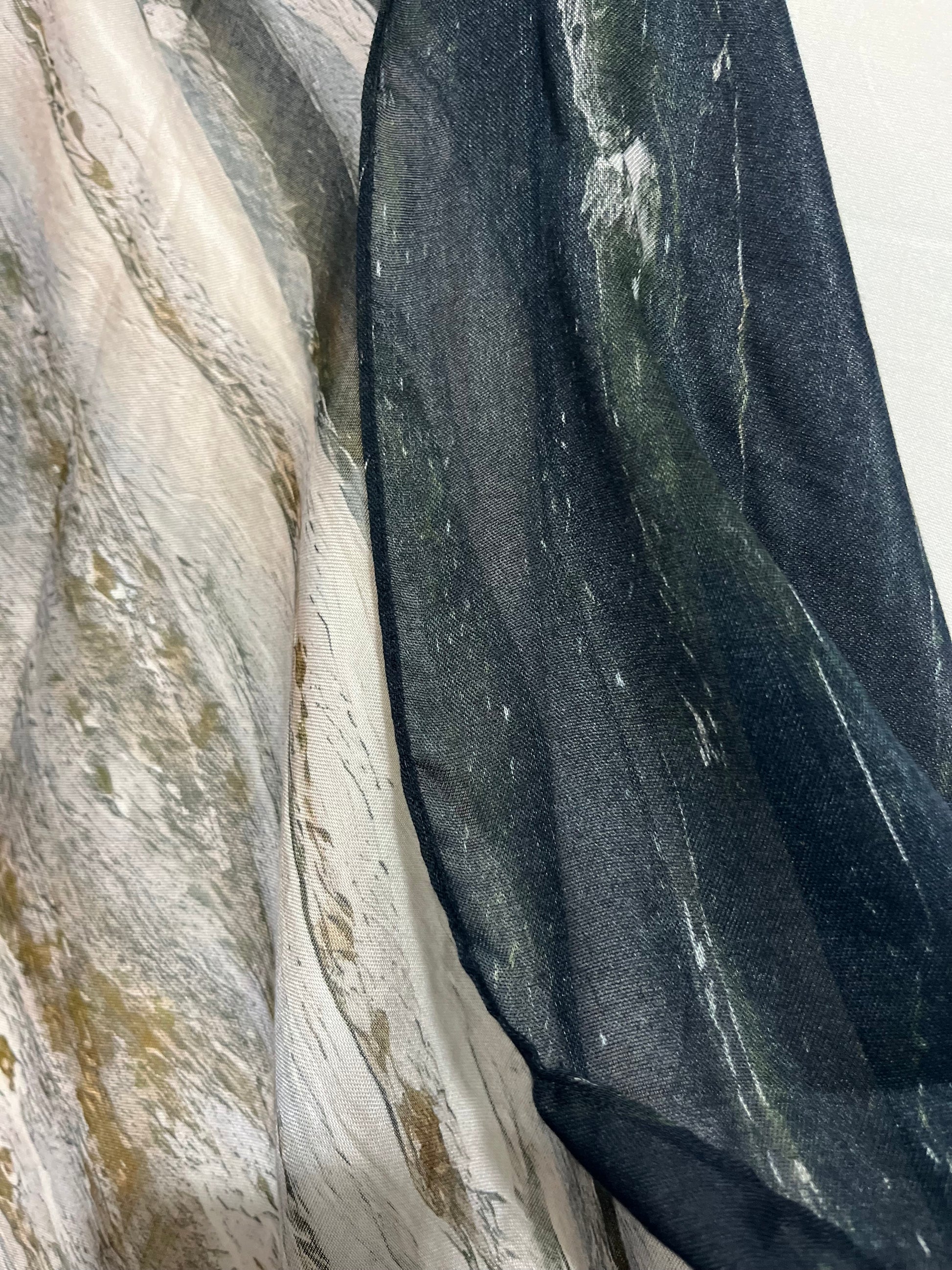 Versatile Modal Scarf with subtle shine and seamless double-sided design, perfect for everyday wear