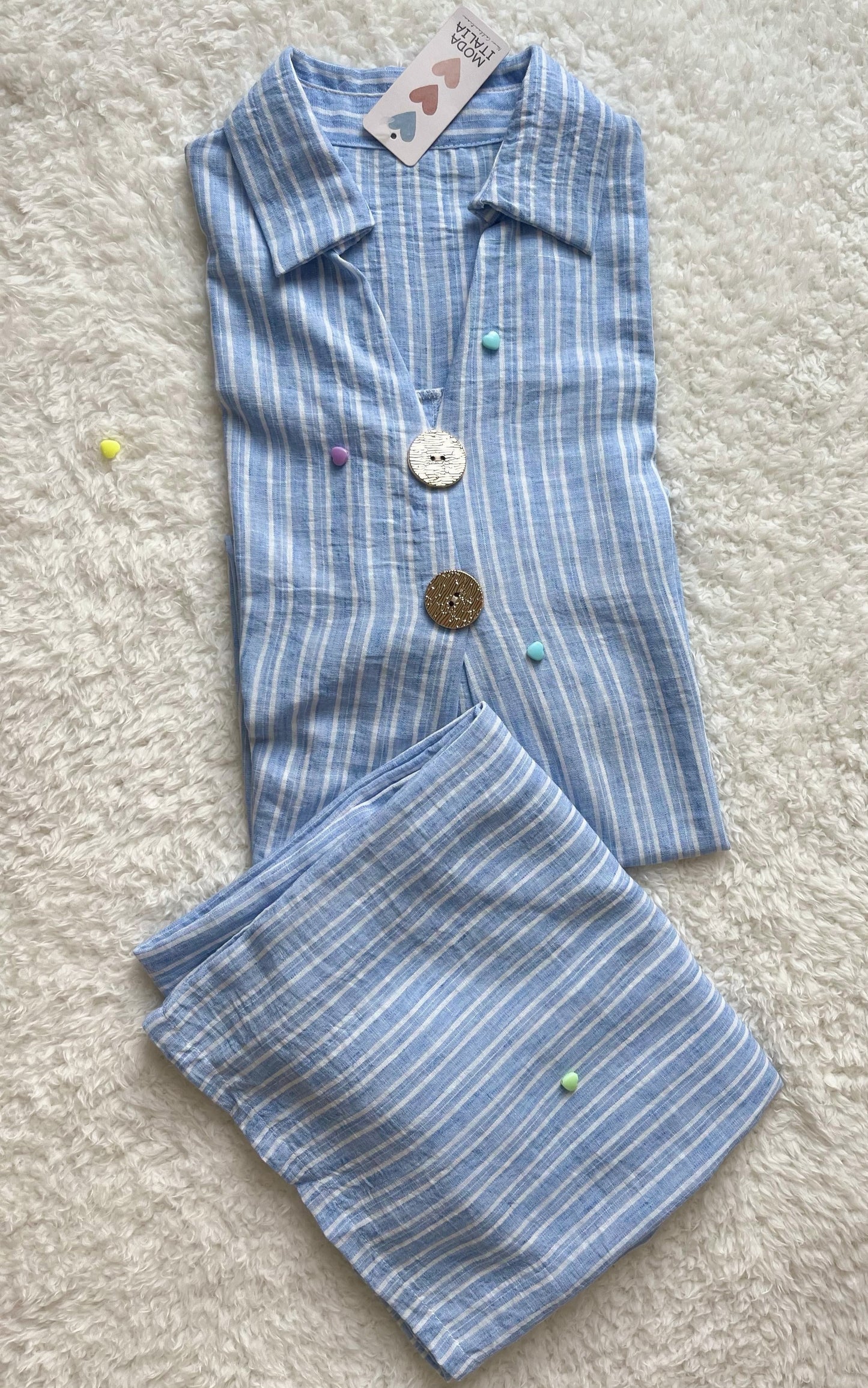 Model in baby blue striped linen co ord set for women featuring relaxed fit shirt and trousers