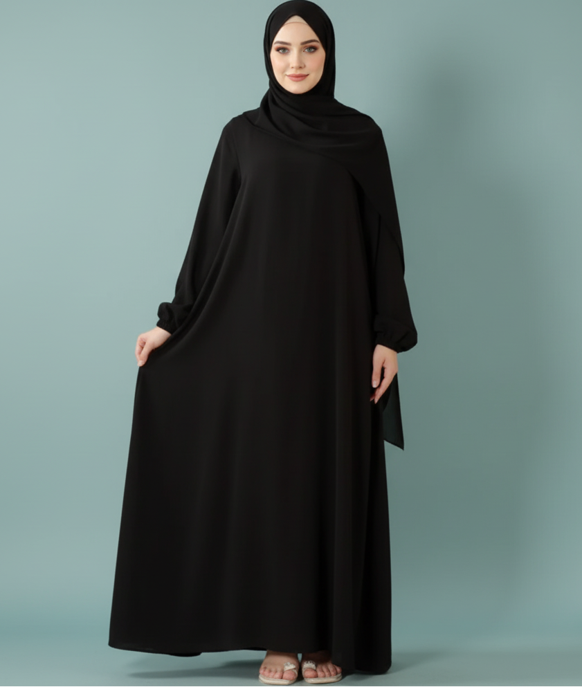<meta name="description" content="Discover the Everyday Black Abaya with practical side pockets. A timeless, modest, and elegant design made for comfort and everyday wear.">
