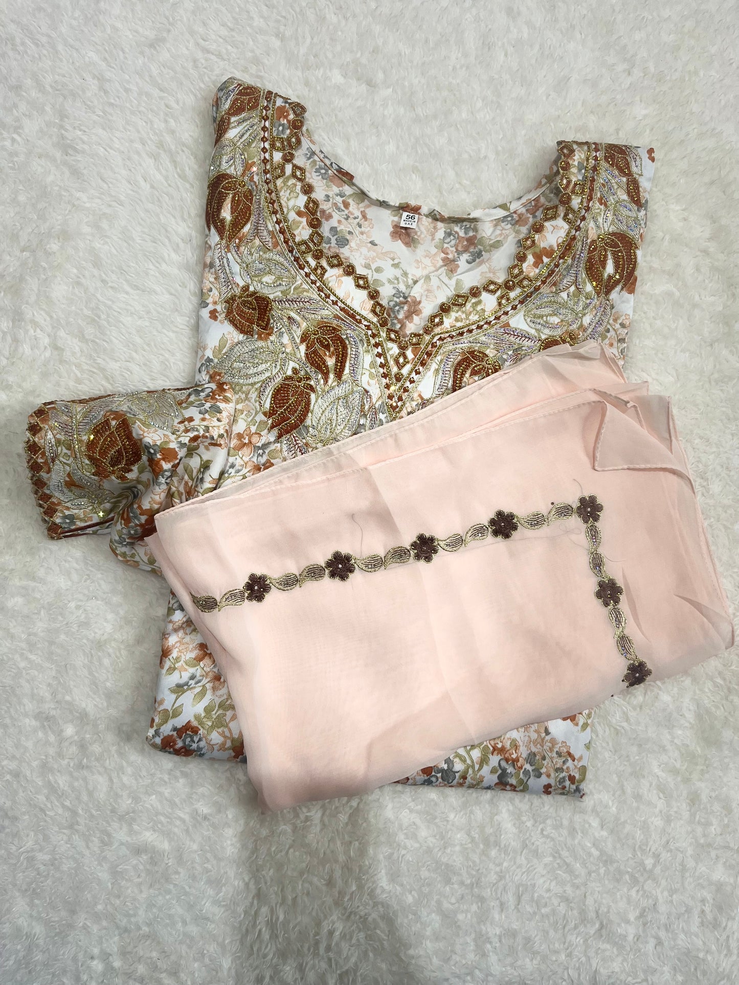 Luxury Desert Rose Mukhawar with intricate embroidery and flowing silhouette