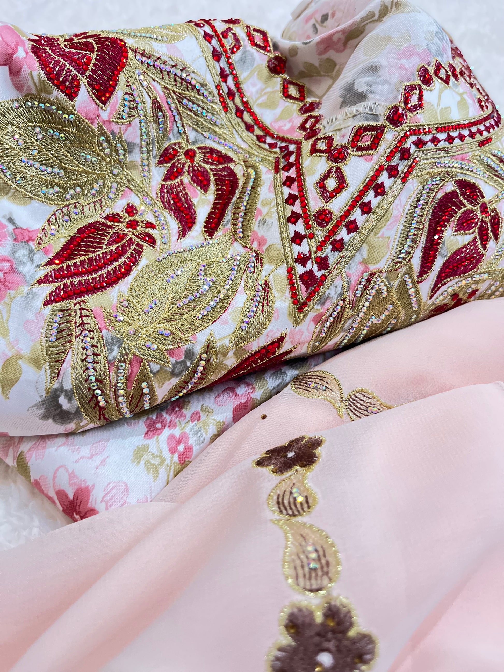 Luxury ruby Mukhawar with intricate embroidery and flowing silhouette