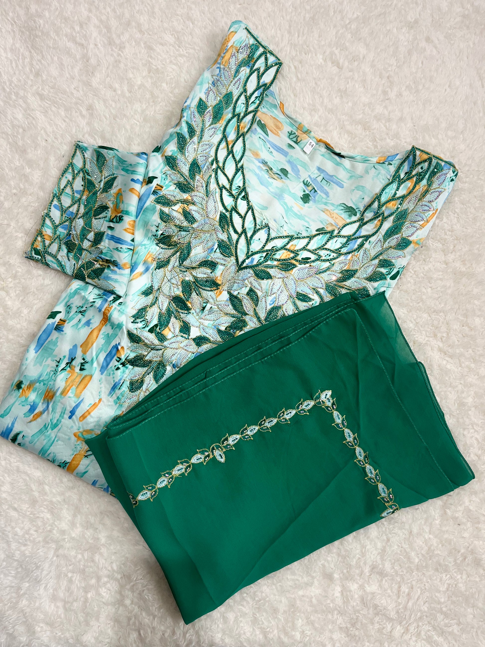 Elegant green Mukhawer modest wear inspired by Dubai Gulf fashion