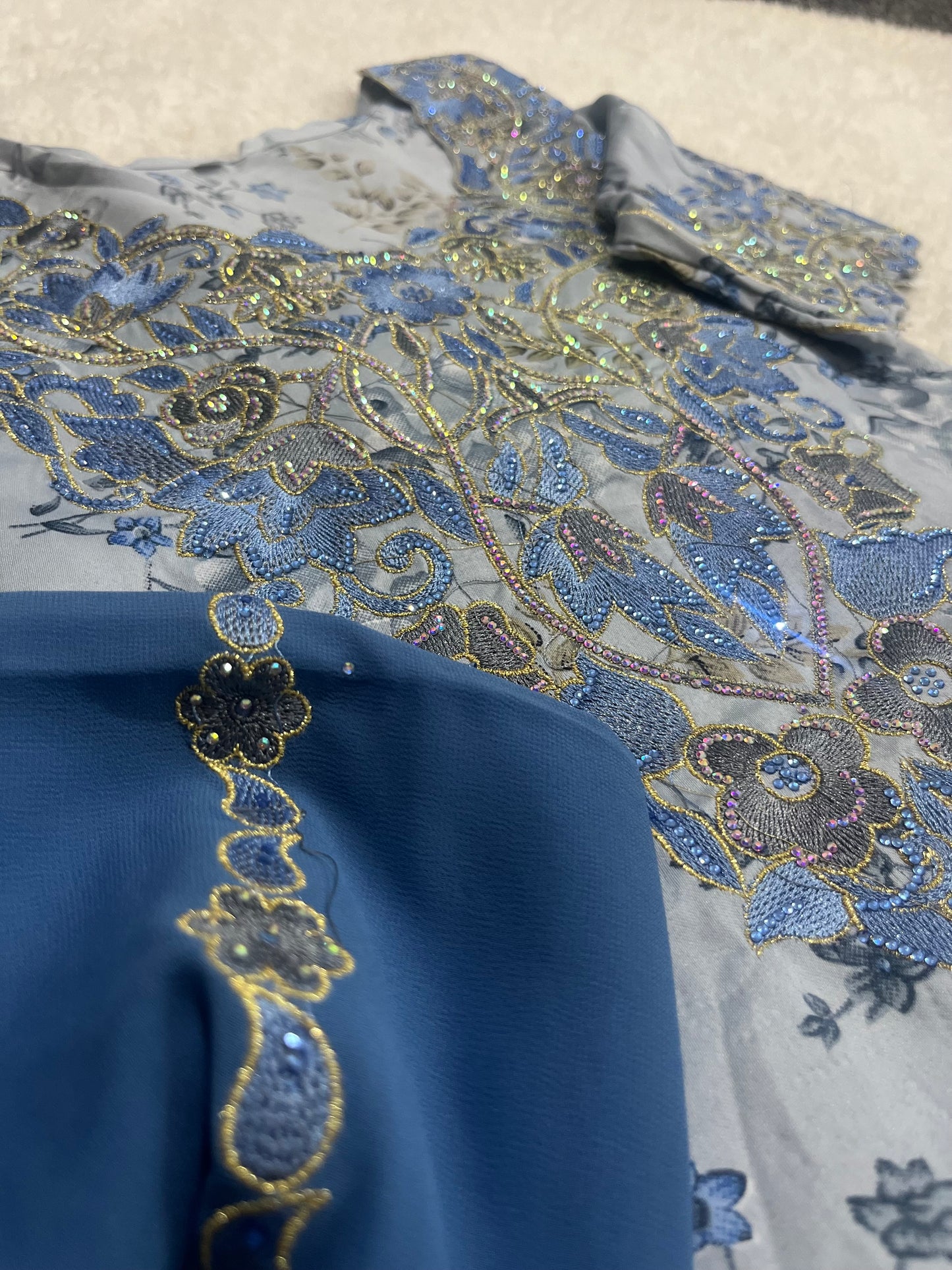 Luxury sapphire Mukhawar with intricate embroidery and flowing silhouette