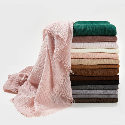 Neutral crinkle cotton hijab with a soft, breathable fabric and defined crinkles.