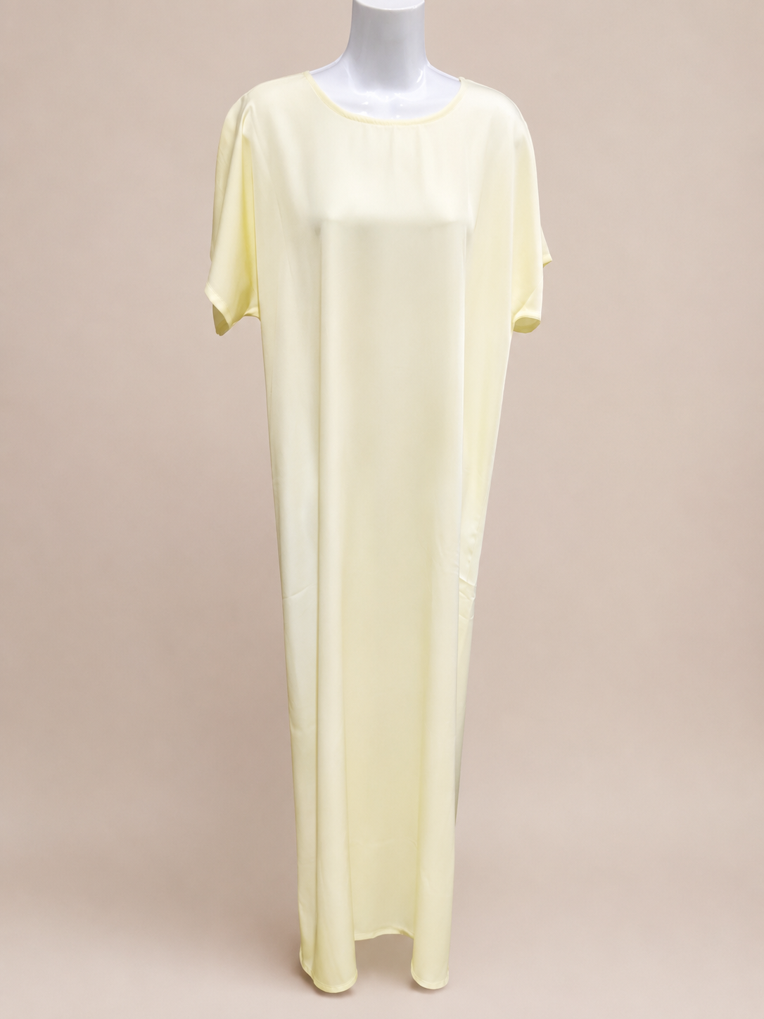 Matching butter yellow slip dress made from soft premium Nida fabric, designed to pair with the ZAHRA Open Abaya